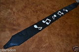 Carlino SRV style Strap Replica black leather, with white notes, suede backing